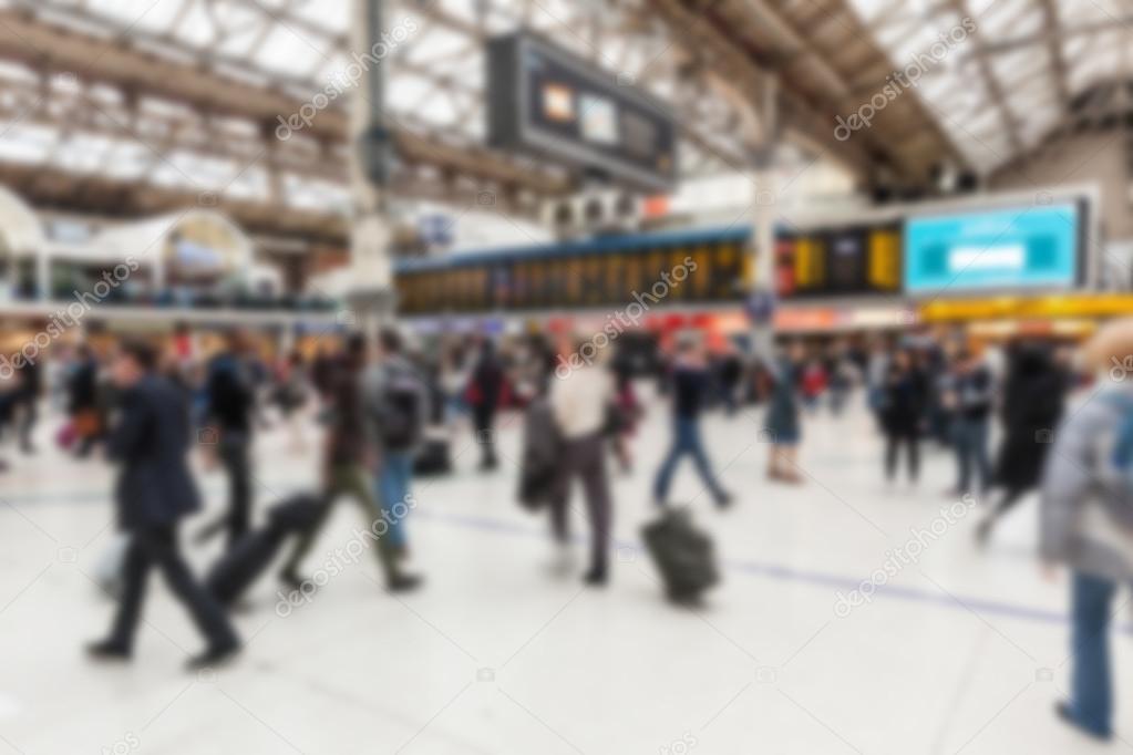 Crowded station during rush hour in London, blurred background