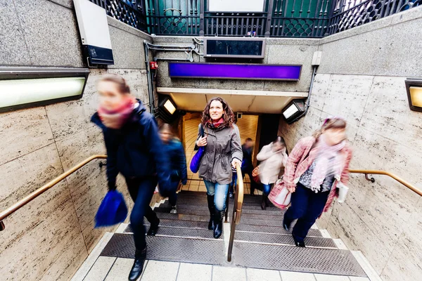 Young woman at tube exit in London — Stock Photo, Image