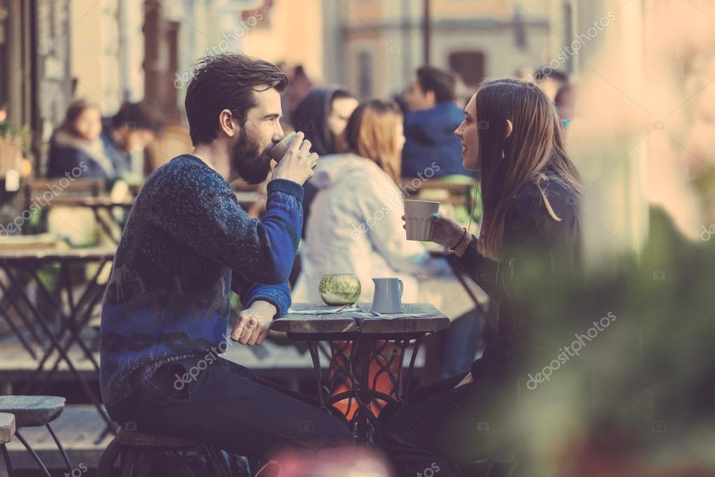 Hipster couple drinking coffee in Stockholm old — Stock