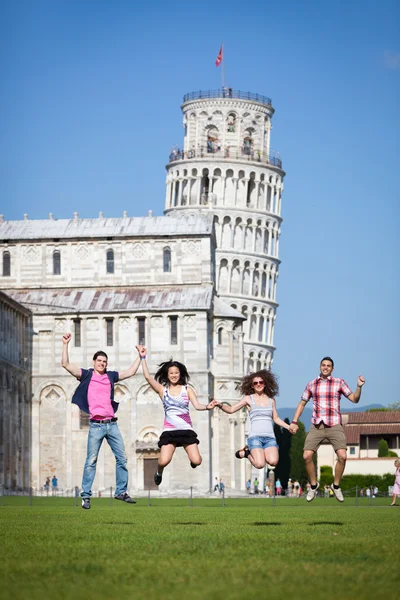 Friends Jumping near Pisa Tower — Stock Photo, Image