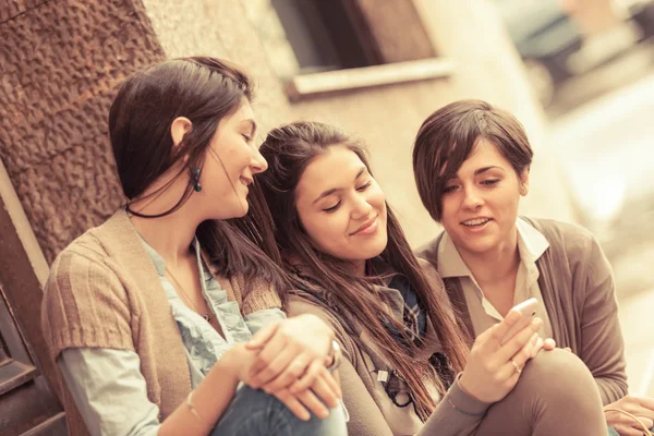 Women Sending Message with Mobile Phone Stock Photo