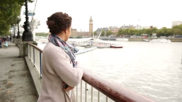 Mixed race woman taking a selfie in London with her smart phone — Stock Video