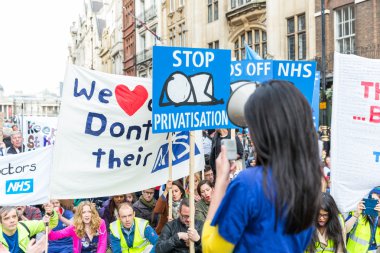 Thousands Junior doctors protest in London clipart