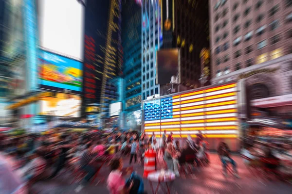 United States flag with blurred scene around — Stock Photo, Image