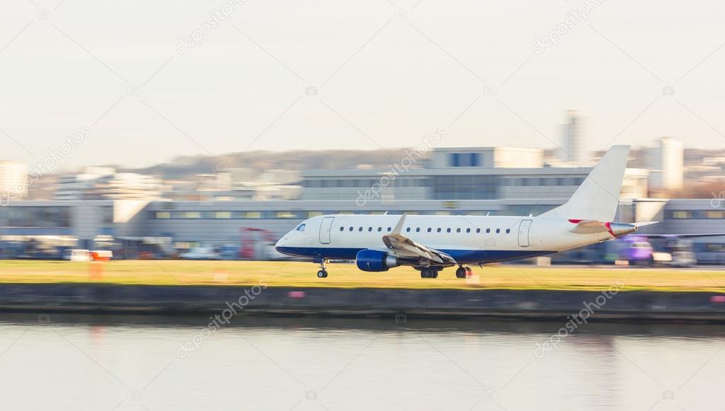 Panning view of an airplane taking off or landing