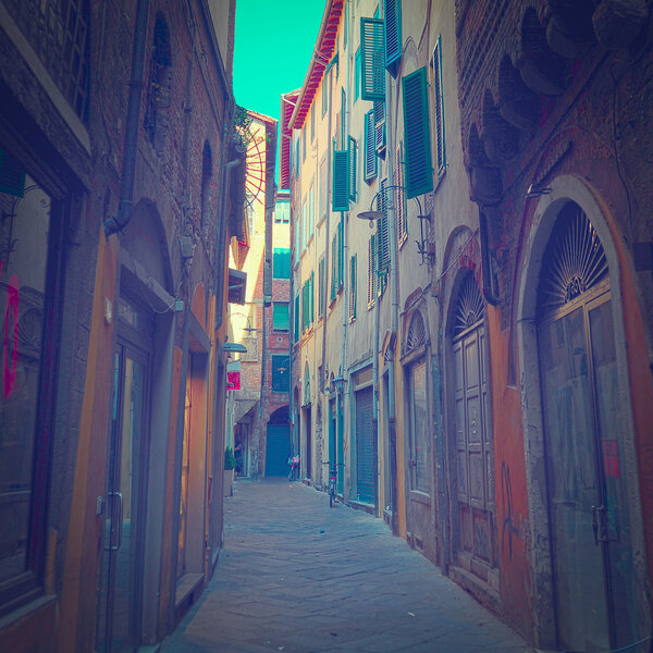 Narrow Alley with Old Buildings in Italian City of Lucca, Instagram Effect