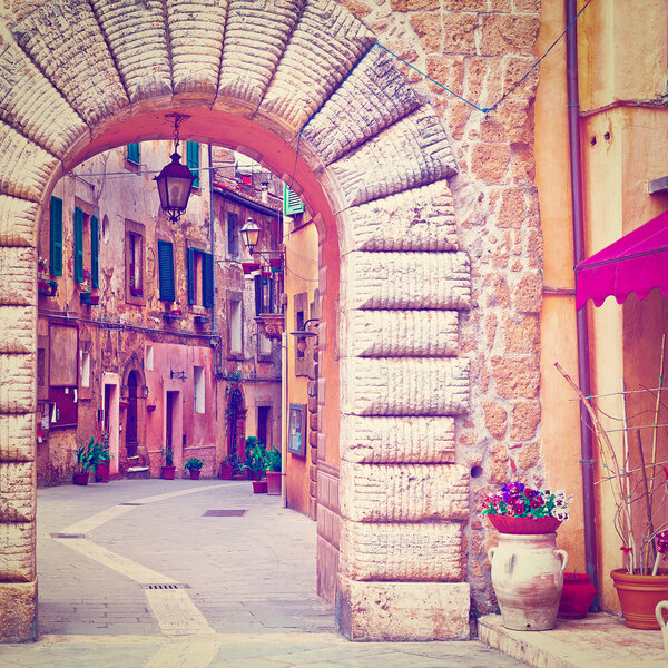 Arch of the Narrow Street with Old Buildings in the Medieval Italian City, Instagram Effect