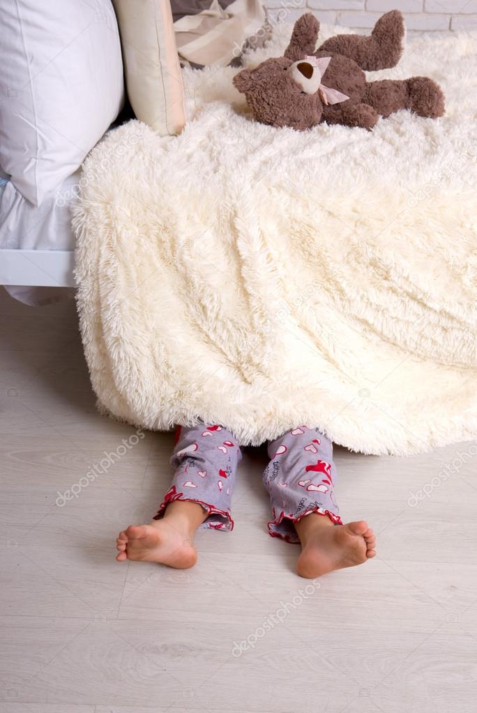 Child Under Bed