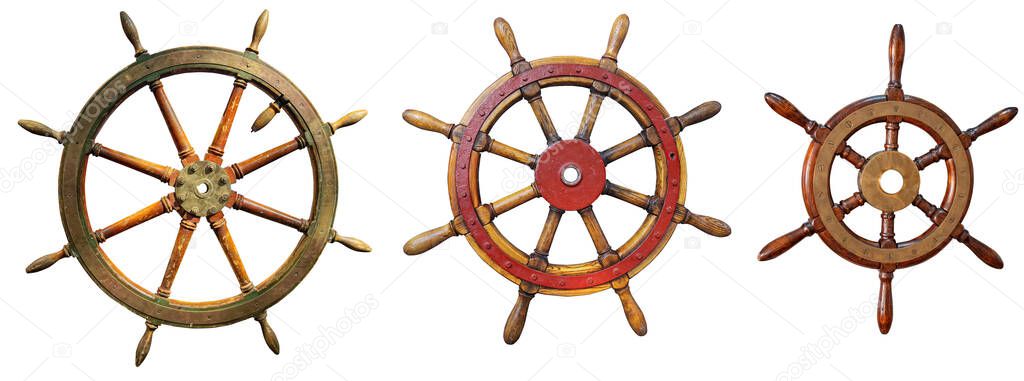 Small set of three different classic steering wheels for sailing ship isolated on white background 