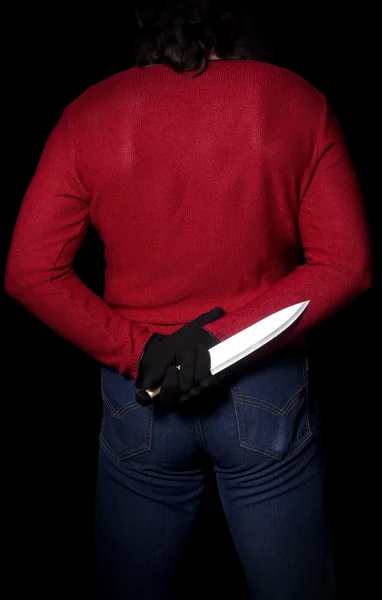 Homme avec couteau derrière le dos — Photo