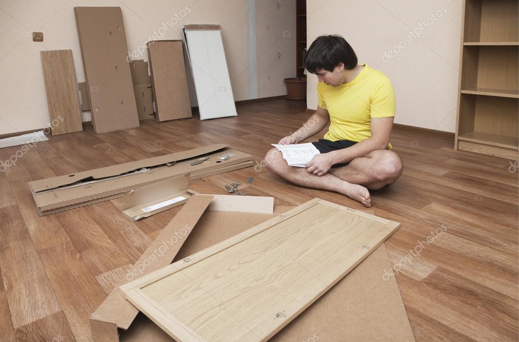 Assembling furniture — Stock Photo © Goodday 83480664