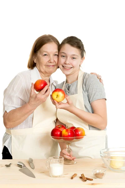 The grandmother and the granddaughter choose apples — Stock Photo, Image