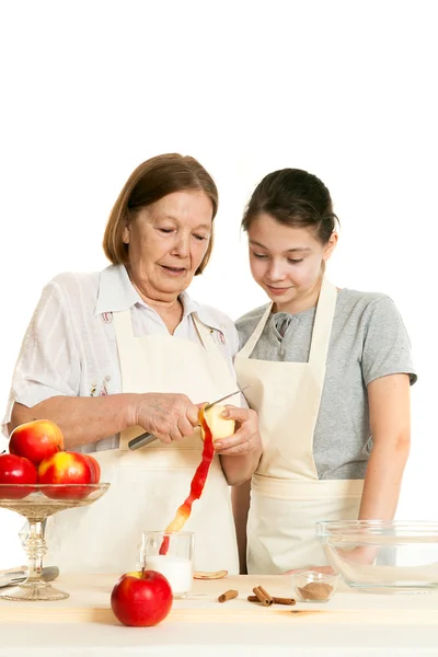 The grandmother teaches the granddaughter — Stock Photo, Image