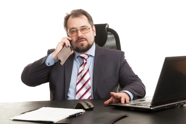 Бизнесмен общается по телефону — стоковое фото