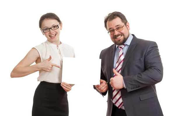 The woman and the man hold a sheet of paper — Stock Photo, Image