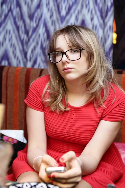 Serious teen with phone — Stock Photo, Image