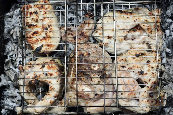 Cooking catfish slices on the grill — Stock Photo, Image