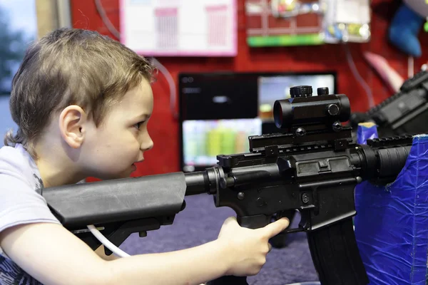 Boy at shooting range — Stock Photo, Image