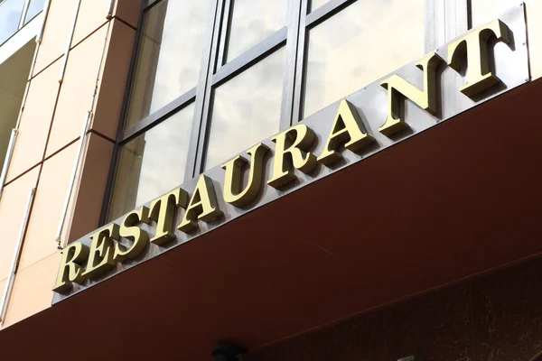 The restaurant sign — Stock Photo, Image