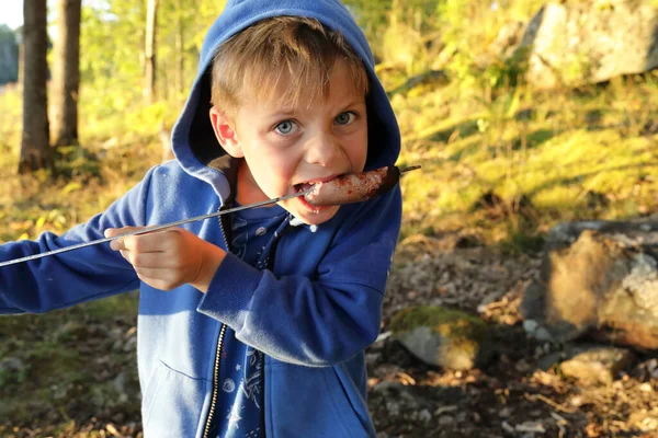 Child Eating Sausage Skewer Forest Karelia — Stock Photo, Image