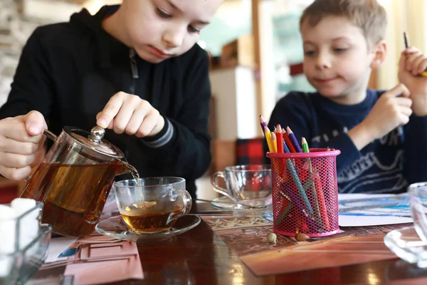 Portrait Child Pouring Tea Cafe — Stock Photo, Image