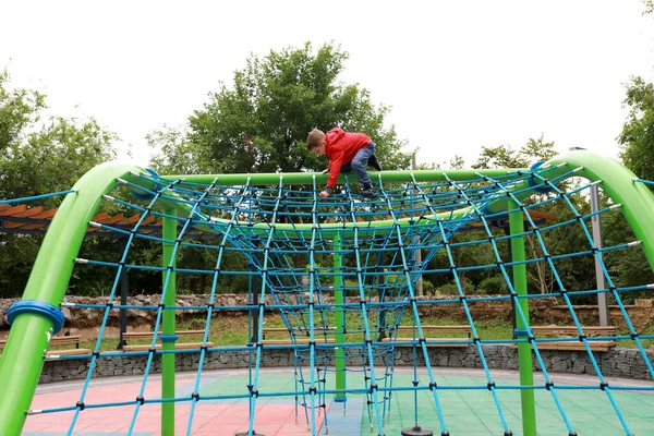 Boy Climbing Net Outdoor Playground — Stock Photo, Image