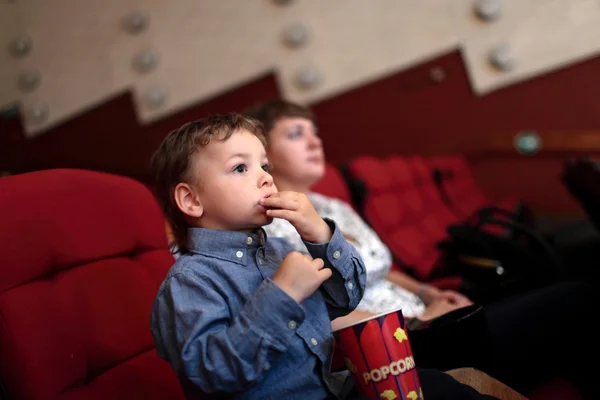 Boy eating popcorn