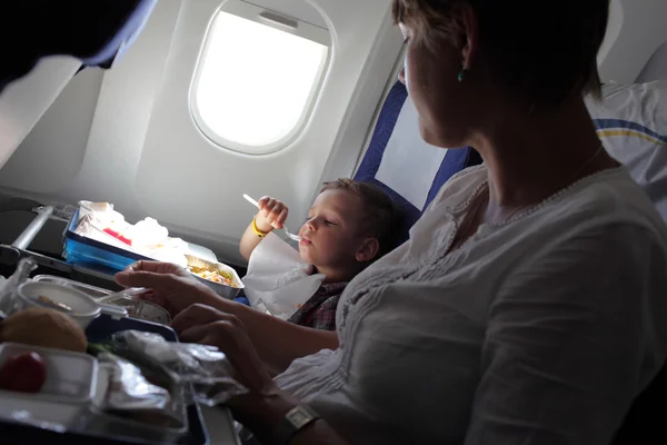 Mother with son have lunch — Stock Photo, Image