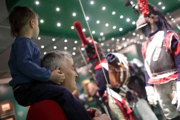 Grandfather with grandson in museum — Stock Photo, Image