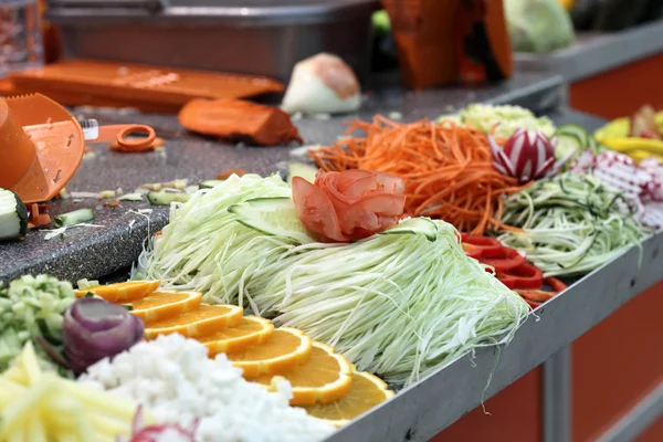 Sliced vegetables on a counter — Stock Photo, Image