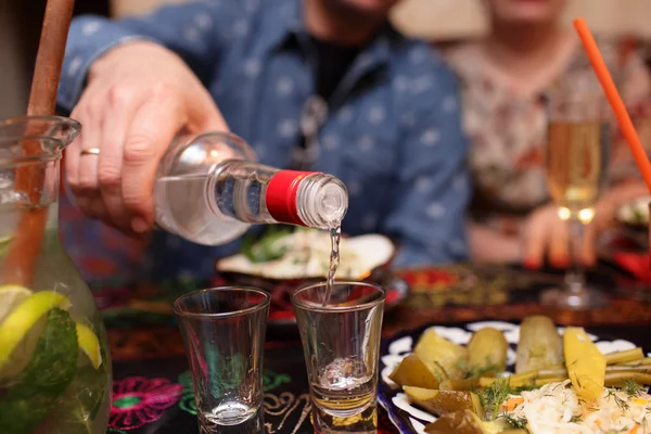 Man pouring vodka — Stock Image Man pouring vodka Royalty Free Stock Images