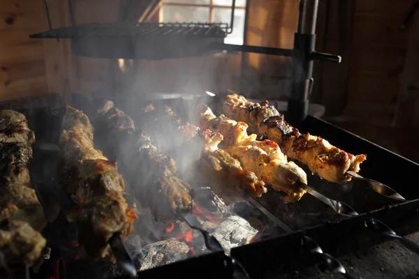 Fried meat in smoke — Stock Photo, Image