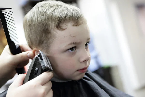 Boy having a haircut — Stock Photo, Image