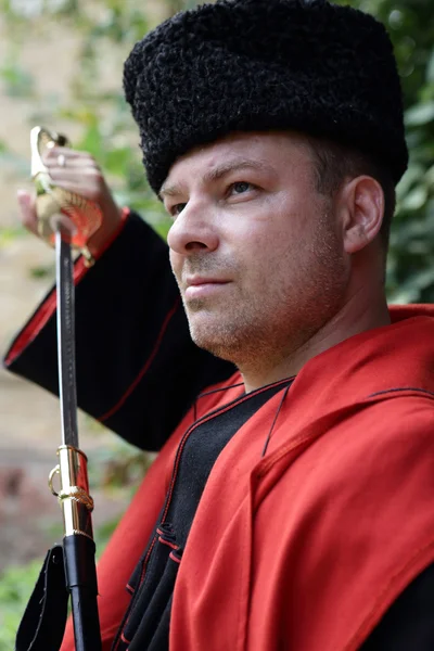 Kuban Cossack holding a saber — Stock Photo, Image