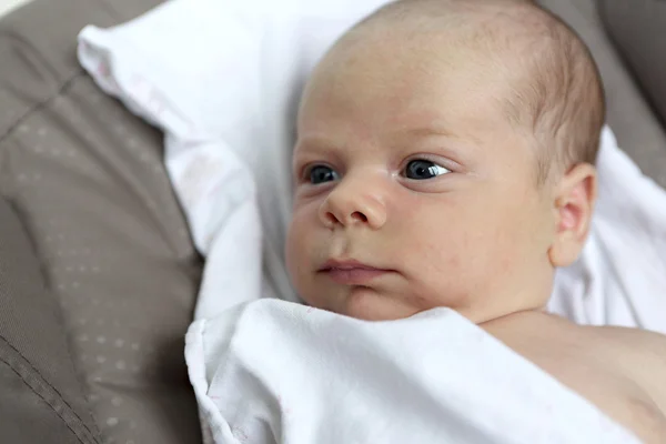 Pensive newborn baby — Stock Photo, Image