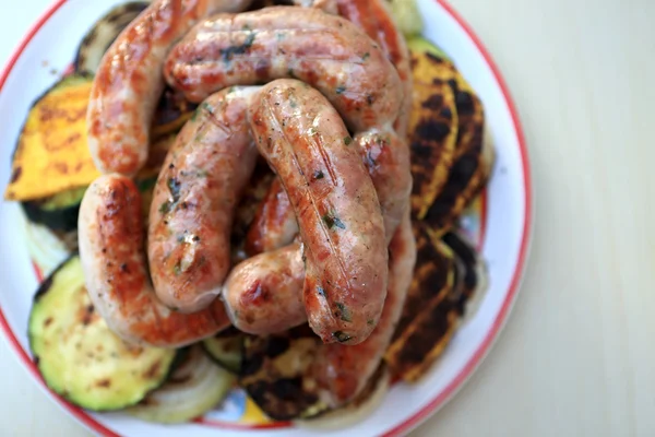 Plate with grilled sausages — Stock Photo, Image