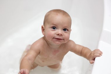 Baby boy in bathtub clipart