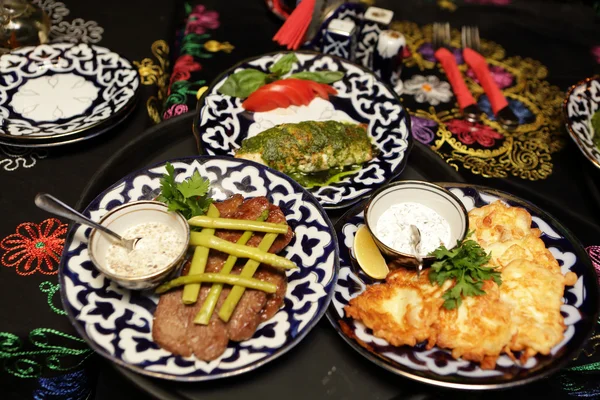 Various dish on the plates — Stock Photo, Image