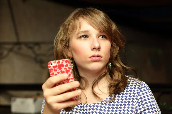 Teen posing with a smartphone — Stock Photo, Image