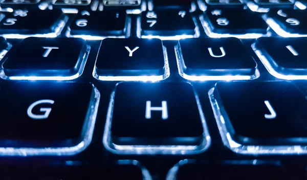 Neon keyboard with enter button. Focus on the  . — Stock Photo, Image