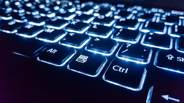 Neon keyboard with enter button. Focus on the  . — Stock Photo, Image