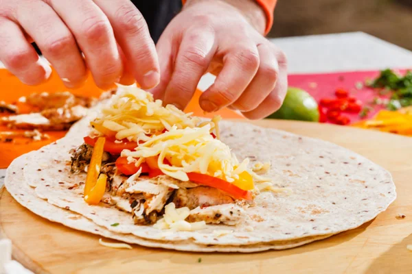 Chef making tortilla — Stock Photo, Image