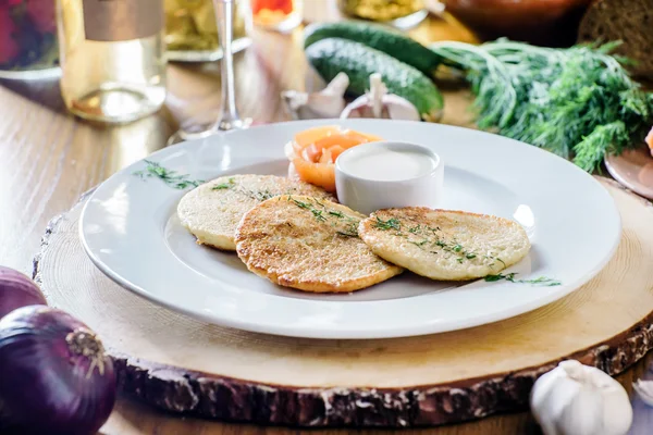 Potato pancakes with salmon — Stock Photo, Image