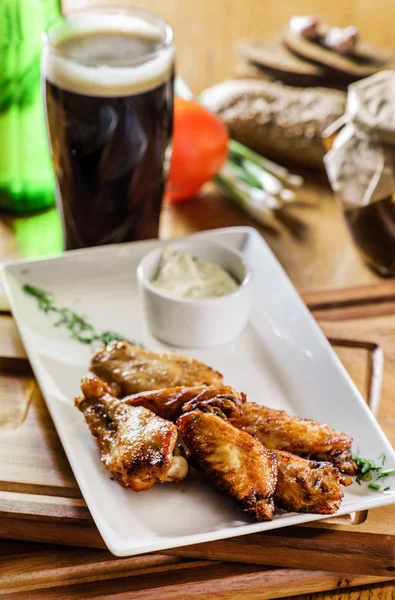 Chicken wings with beer — Stock Photo, Image