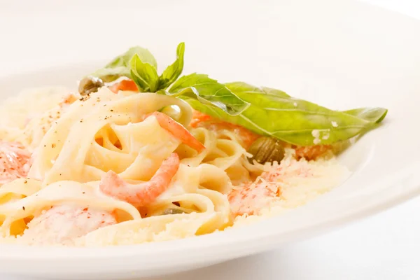 Pasta with shrimps on plate — Stock Photo, Image