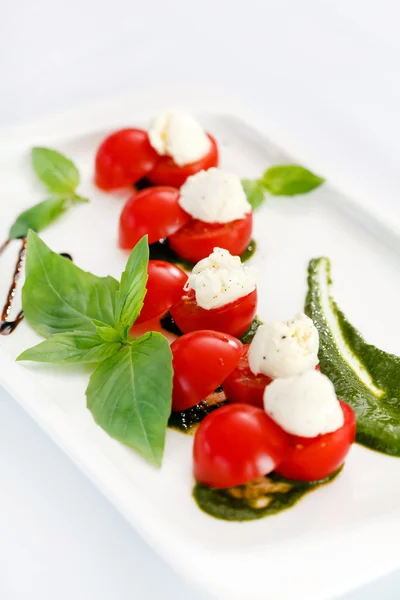 Mozzarella with cherry tomatoes — Stock Photo, Image