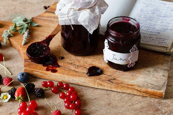 Berry jam on table — Stock Photo, Image