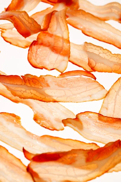 Cut slices of bacon — Stock Photo, Image