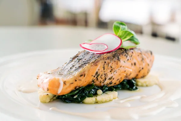 Baked salmon on plate — Stock Photo, Image