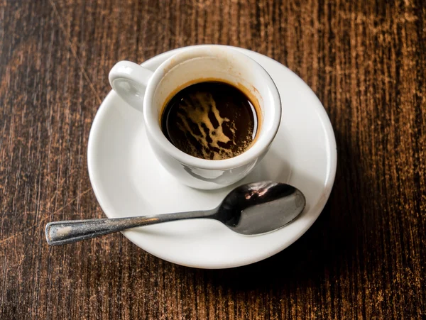 Kopje koffie op plaat — Stockfoto